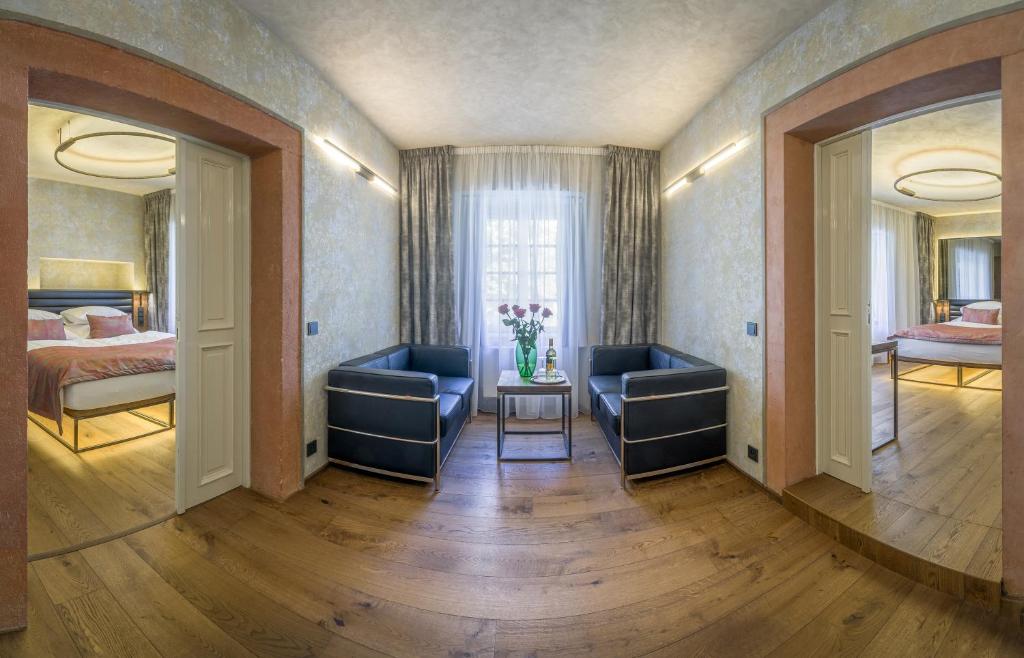 Postel nebo postele na pokoji v ubytování Hotel Waldstein
