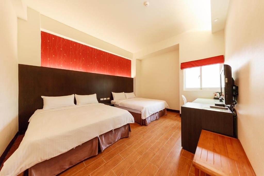 Postel nebo postele na pokoji v ubytování Green Yard B&B