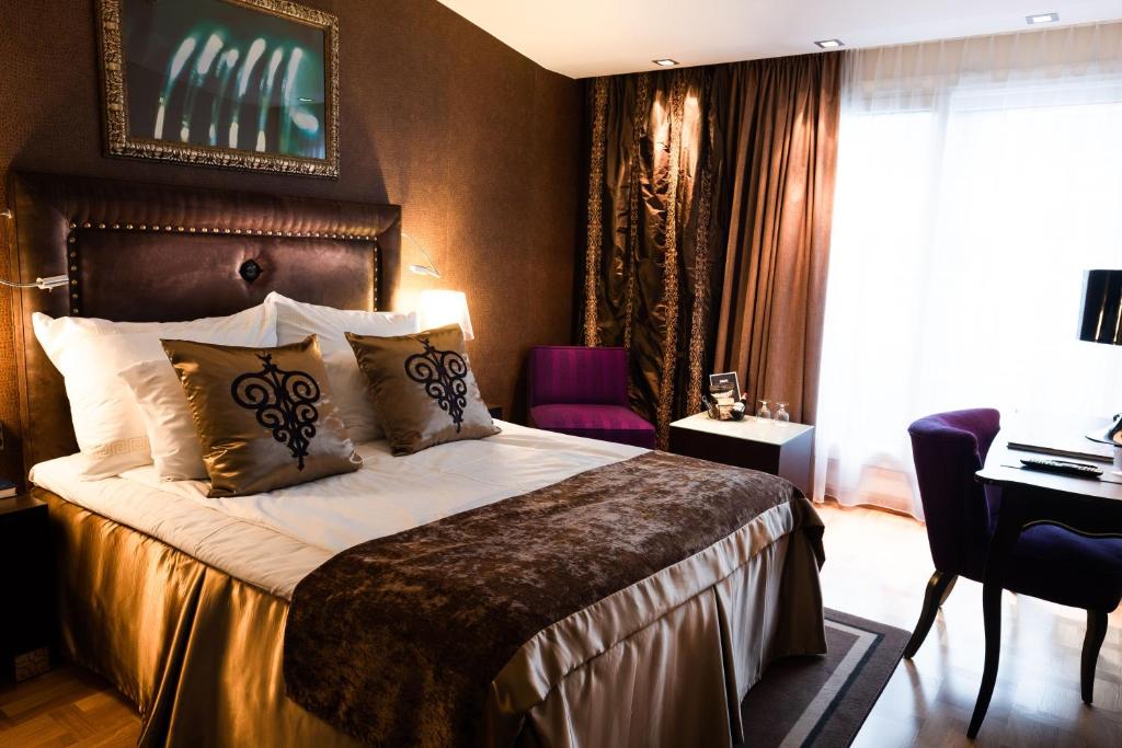 Postel nebo postele na pokoji v ubytování Home Hotel Havnekontoret