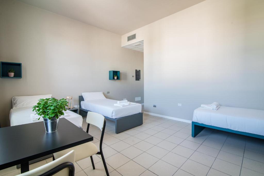 Postel nebo postele na pokoji v ubytování Casa a Colori Padova