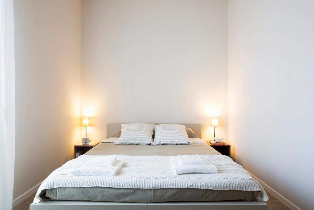 Postel nebo postele na pokoji v ubytování Casa a Colori Padova