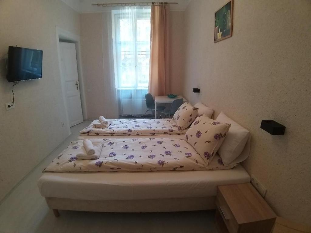 Posteľ alebo postele v izbe v ubytovaní Melisa Apartment