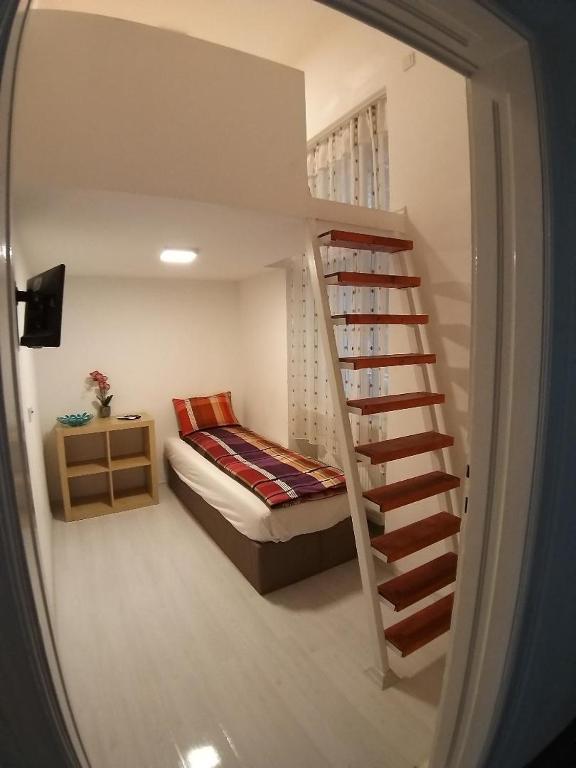 Posteľ alebo postele v izbe v ubytovaní Melisa Apartment