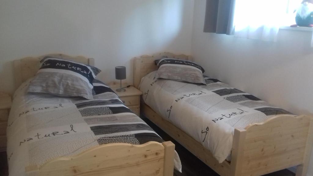 Postel nebo postele na pokoji v ubytování Alice