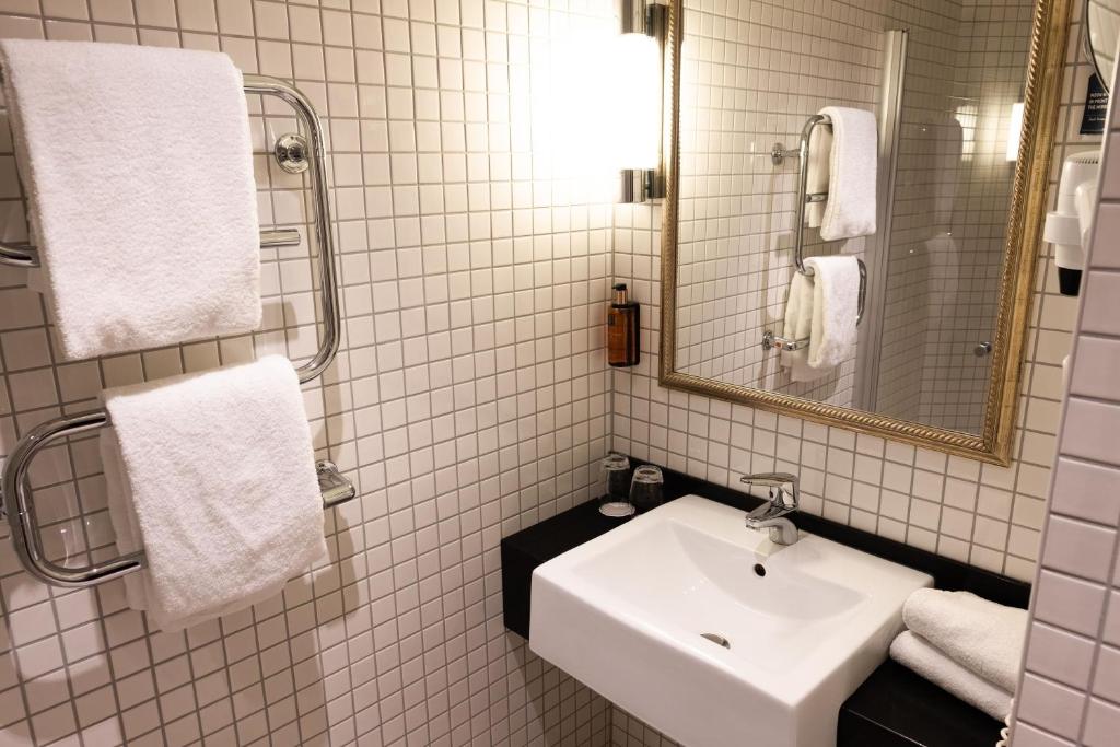 Koupelna v ubytování Home Hotel Havnekontoret