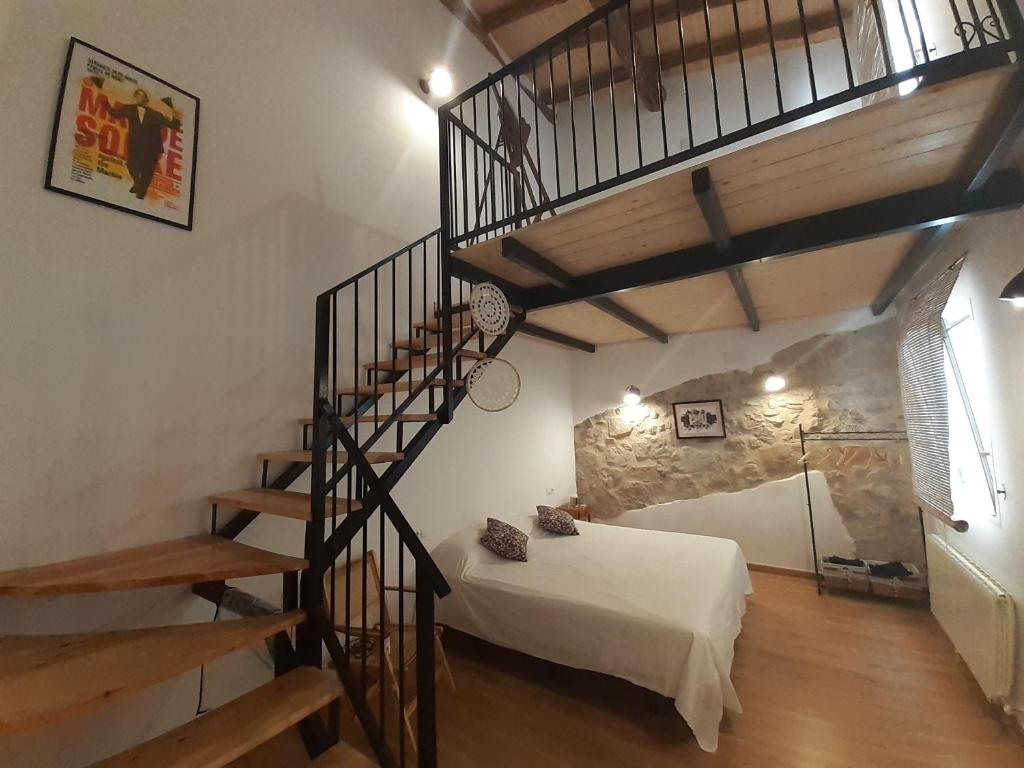 Postel nebo postele na pokoji v ubytování Casa La Foradada