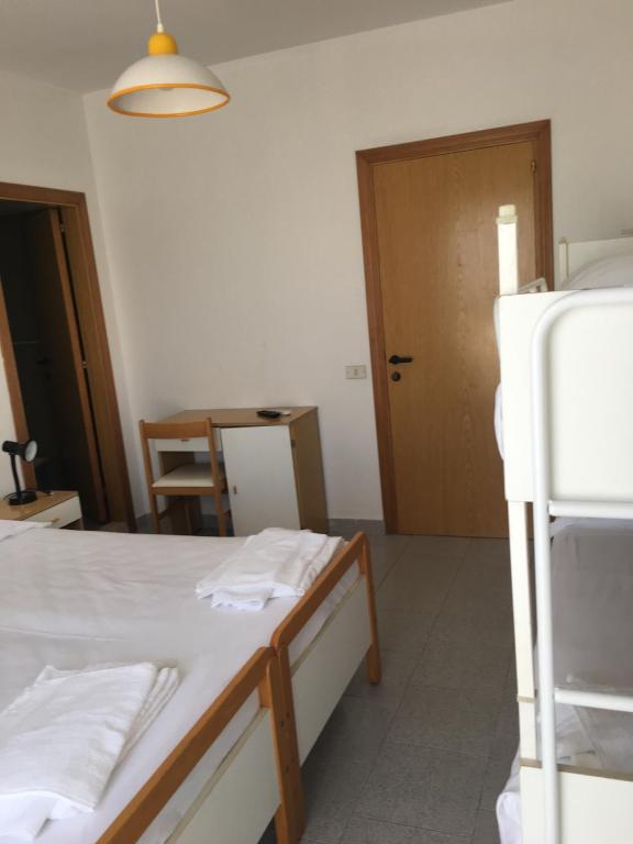 Postel nebo postele na pokoji v ubytování Hotel Alb's