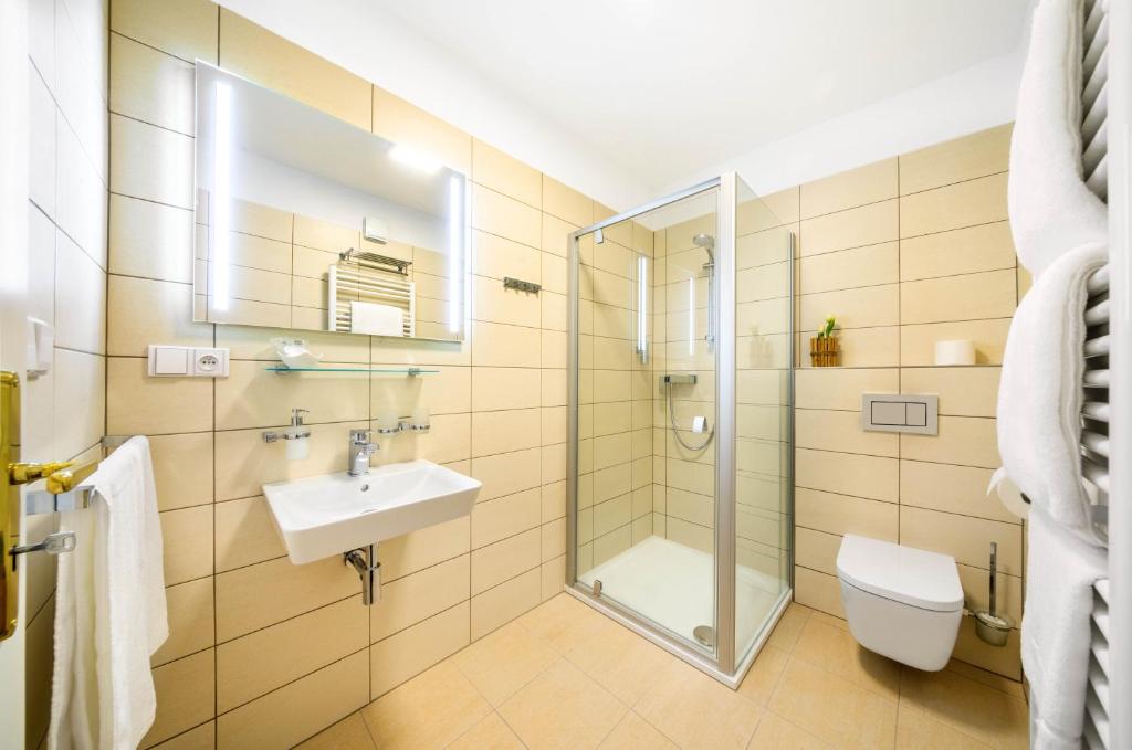 Koupelna v ubytování Hotel Garni Villa Areka