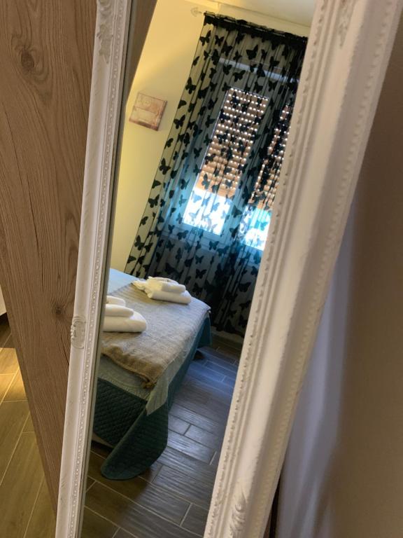 Postel nebo postele na pokoji v ubytování Le Camere di Teo