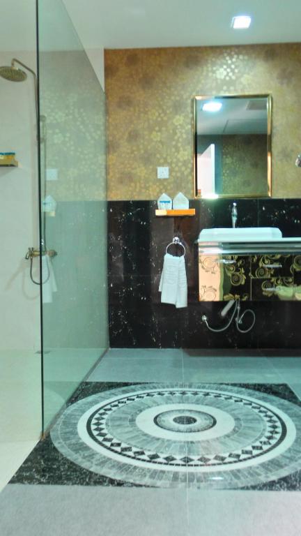Kuchyň nebo kuchyňský kout v ubytování Al Dar Inn Hotel Apartment