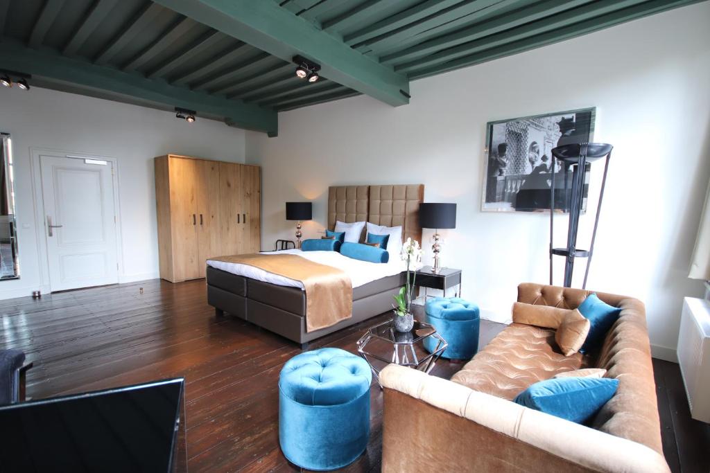 Postel nebo postele na pokoji v ubytování Boutique Hotel Steenhof Suites - Adults Only