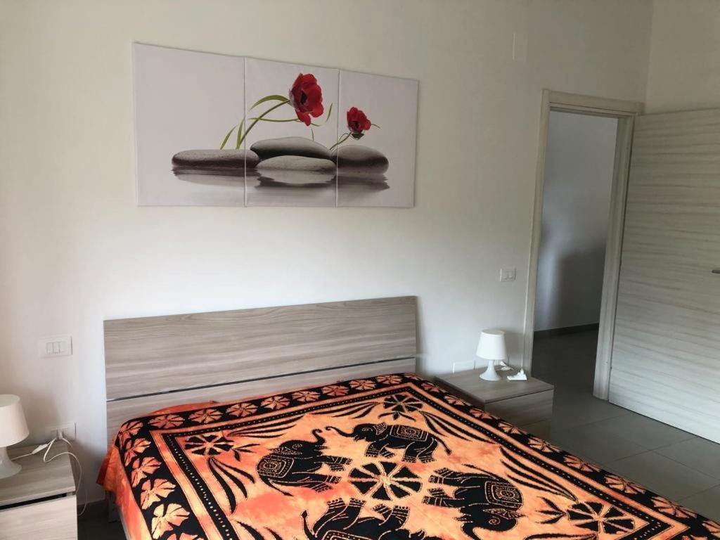 Postel nebo postele na pokoji v ubytování MELOGRANO