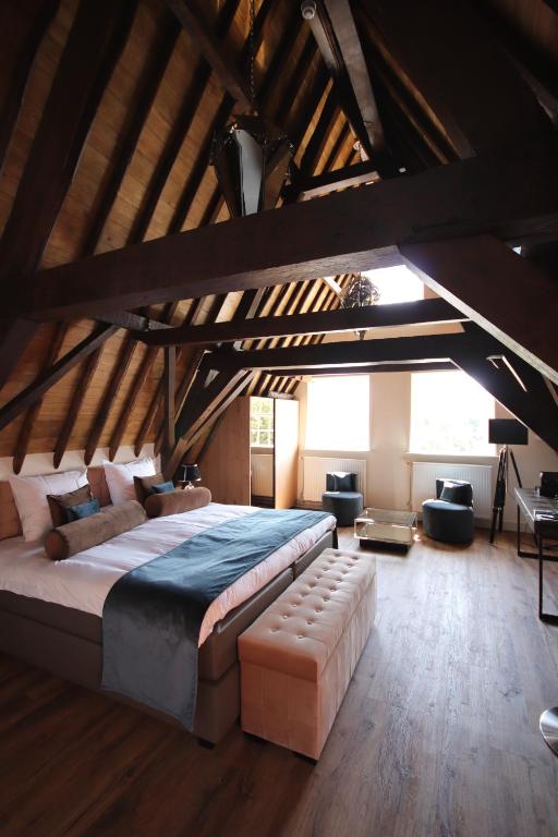 Postel nebo postele na pokoji v ubytování Boutique Hotel Steenhof Suites - Adults Only