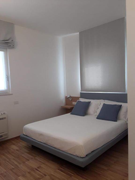 Voodi või voodid majutusasutuse h-sa GUEST HOUSE toas