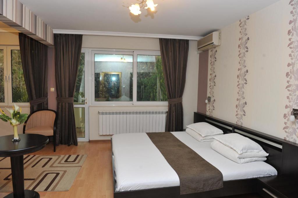 Postel nebo postele na pokoji v ubytování Eros Motel