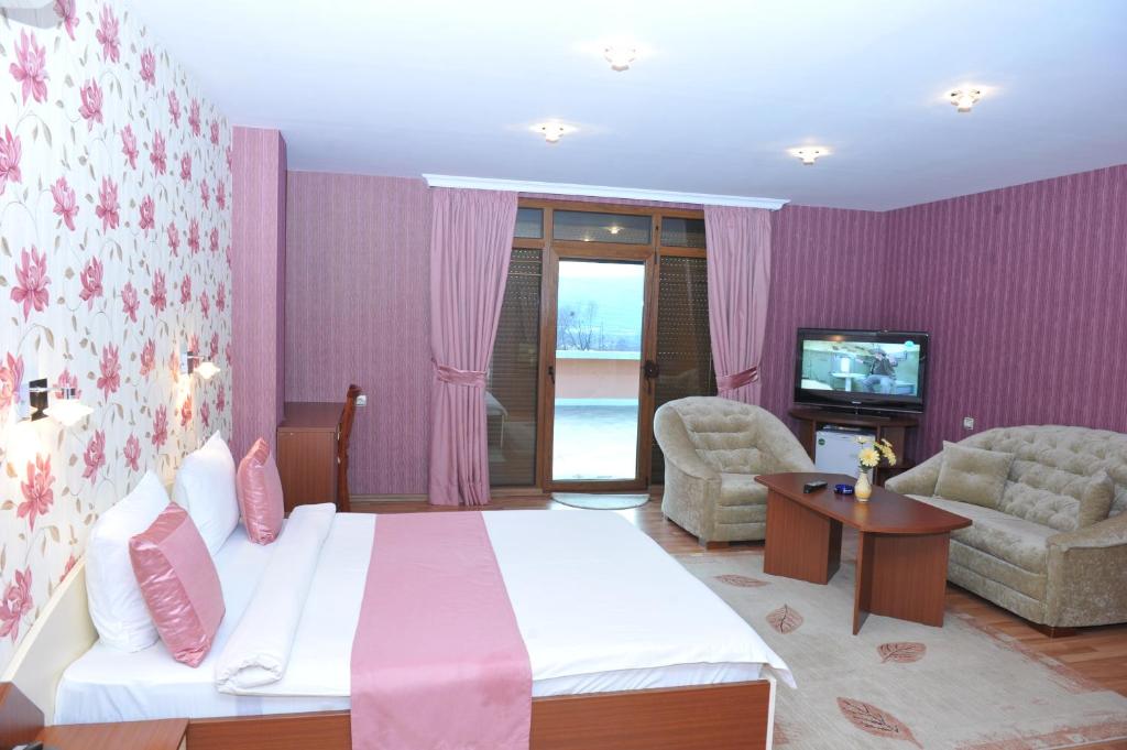 Postel nebo postele na pokoji v ubytování Eros Motel
