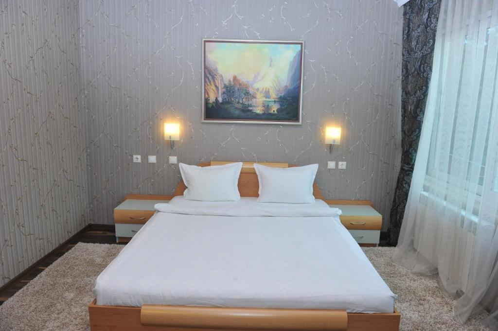 Postel nebo postele na pokoji v ubytování Eros Motel
