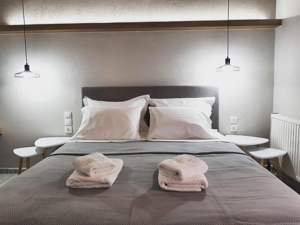Posteľ alebo postele v izbe v ubytovaní Avres Apartments