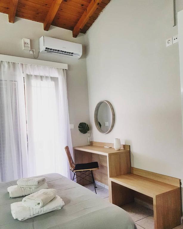 Posteľ alebo postele v izbe v ubytovaní Avres Apartments