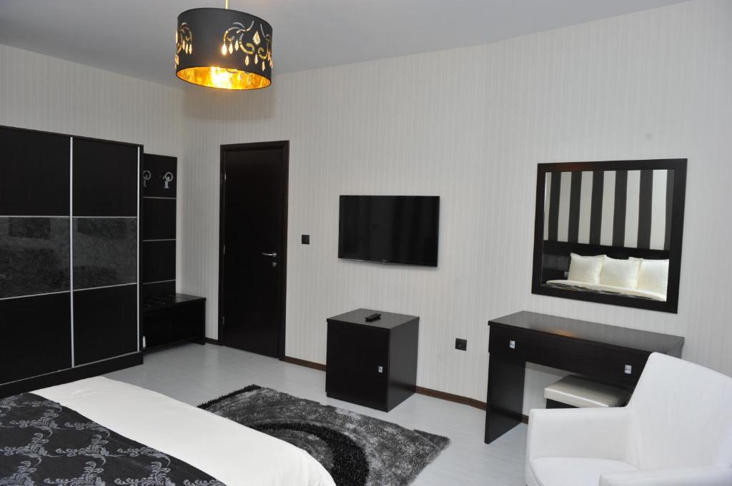Postel nebo postele na pokoji v ubytování Eros Motel