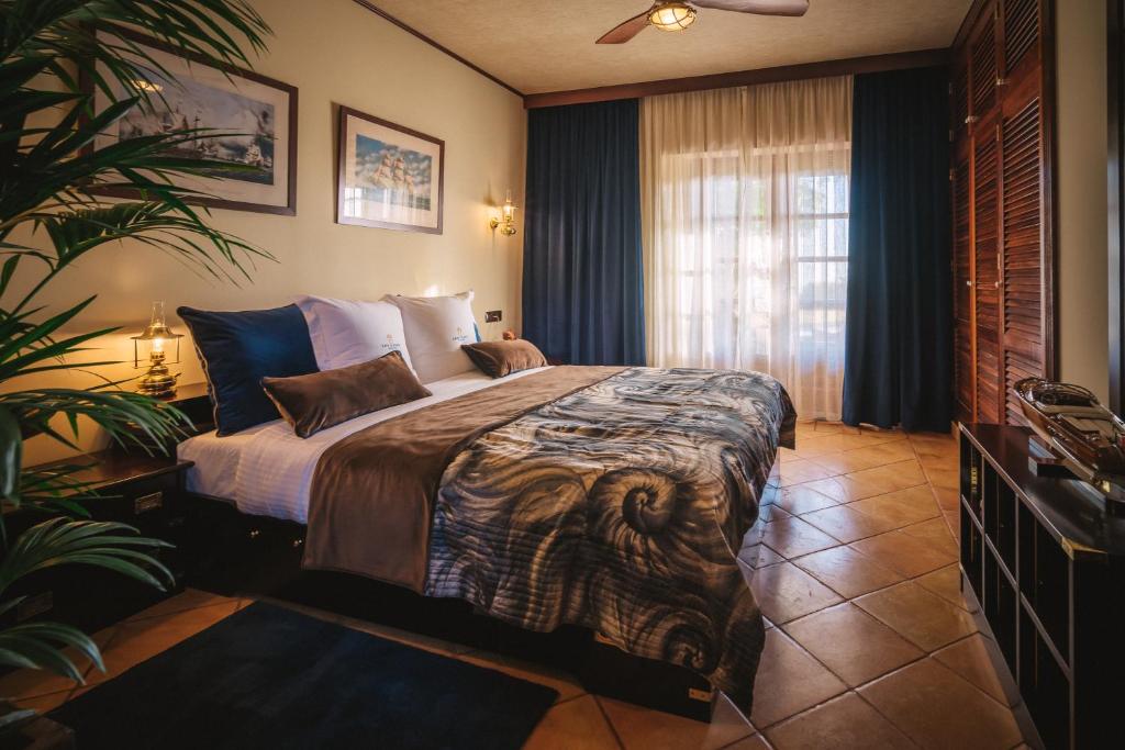 A bed or beds in a room at Finca La Rosa de Los Vientos
