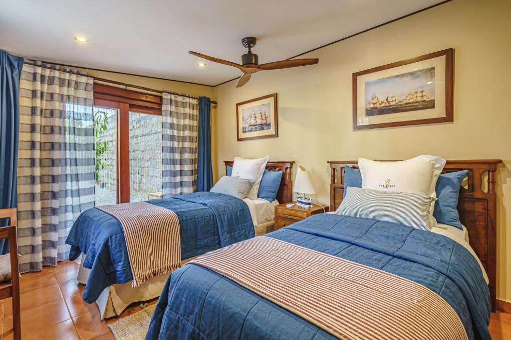 A bed or beds in a room at Finca La Rosa de Los Vientos