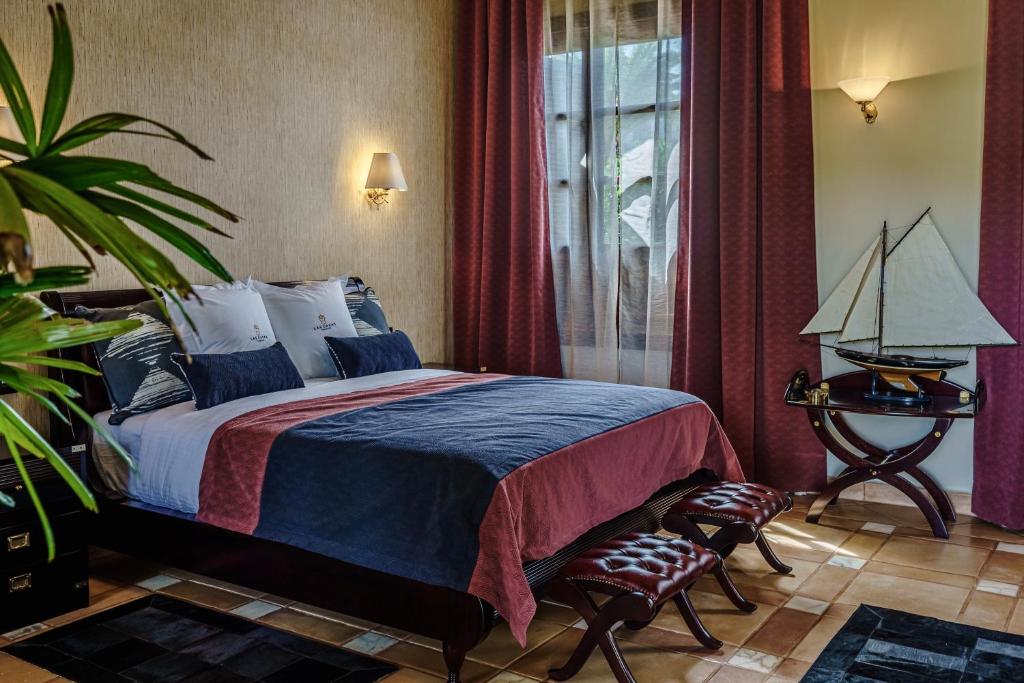 A bed or beds in a room at Finca La Rosa de Los Vientos