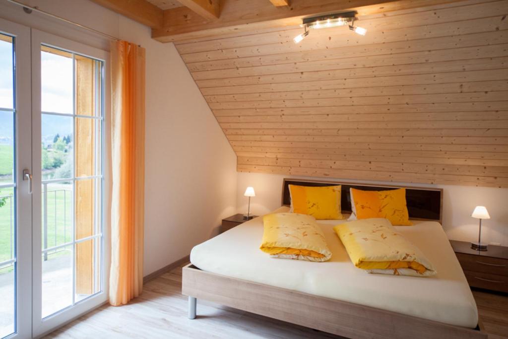 Postel nebo postele na pokoji v ubytování B&B Ferienhof am See