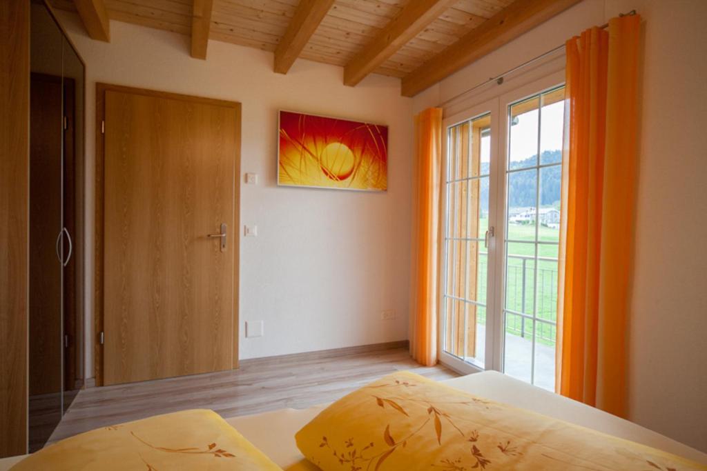 Postel nebo postele na pokoji v ubytování B&B Ferienhof am See