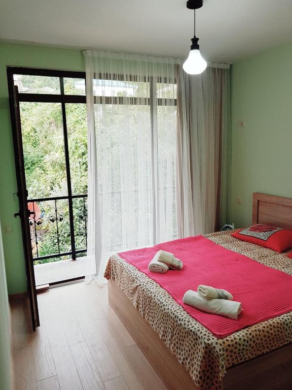 Postel nebo postele na pokoji v ubytování Guesthouse Maria