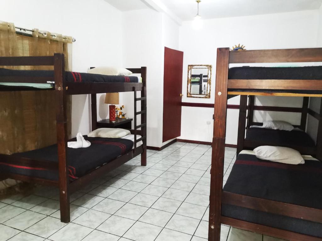 Postel nebo postele na pokoji v ubytování Hostel Shakti