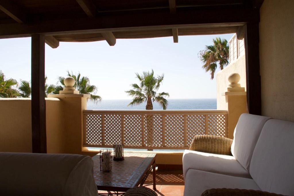 a living room with a view of the ocean at Luxury Villa del Mar - Bahia Feliz in Maspalomas