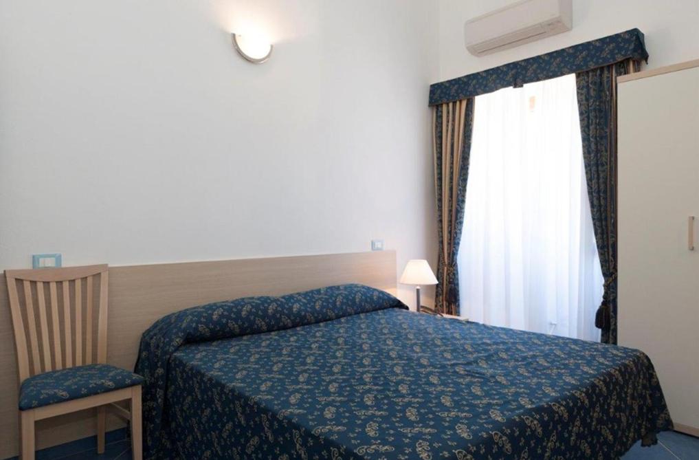 Postel nebo postele na pokoji v ubytování B&B La Terrazza Sul Porto