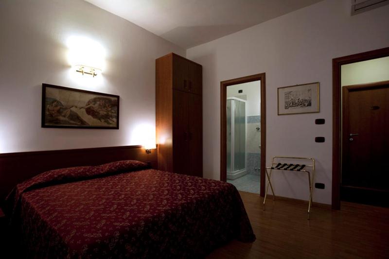 Posteľ alebo postele v izbe v ubytovaní Domus Appia 154 B&B