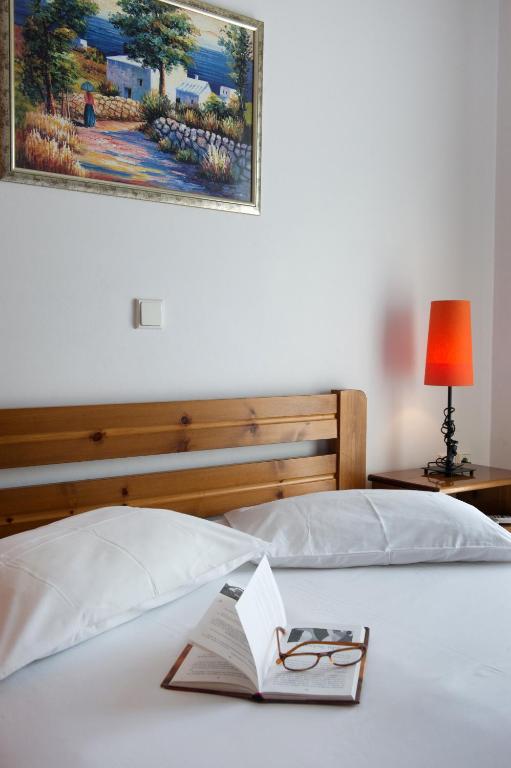 Posteľ alebo postele v izbe v ubytovaní Riverside Αpartments