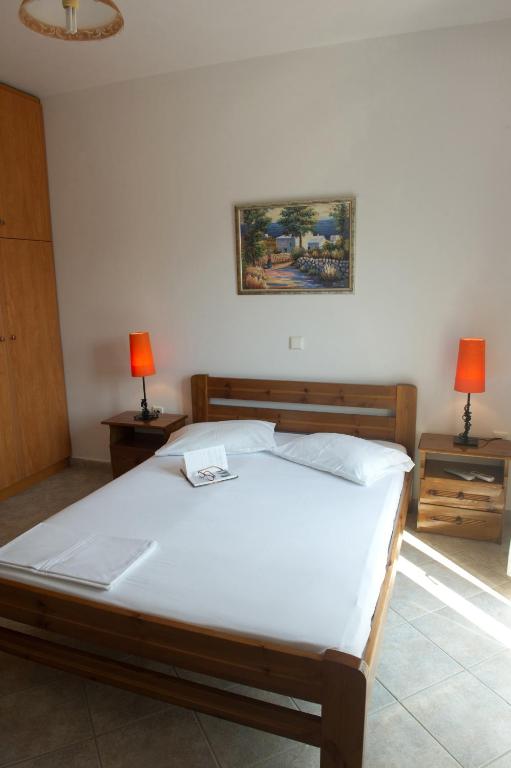 Posteľ alebo postele v izbe v ubytovaní Riverside Αpartments