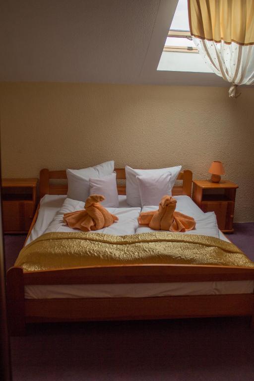 Posteľ alebo postele v izbe v ubytovaní Motelik Lord