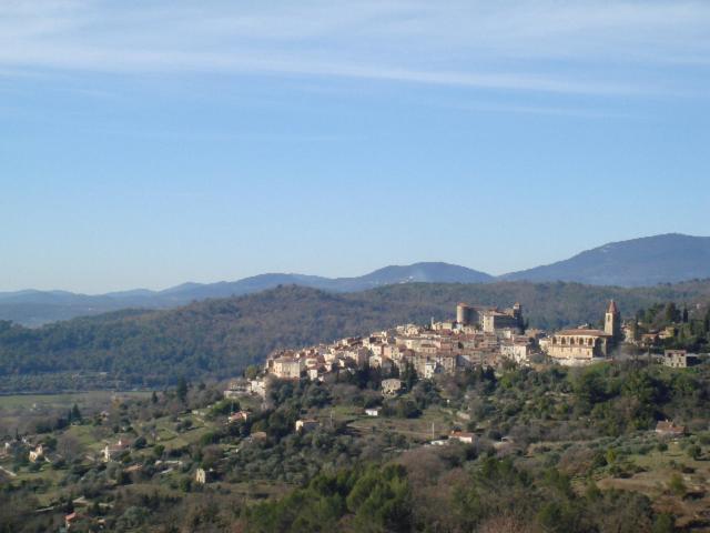 a town on top of a hill with houses at Le Mas Nomade in Callian
