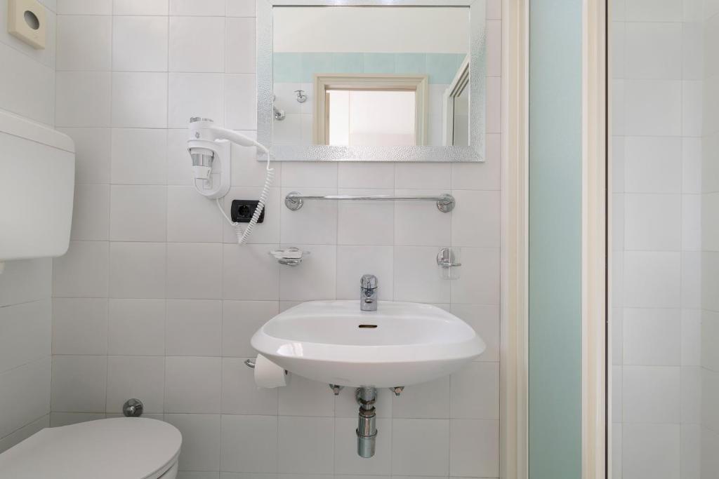 Koupelna v ubytování Hotel Maria Serena