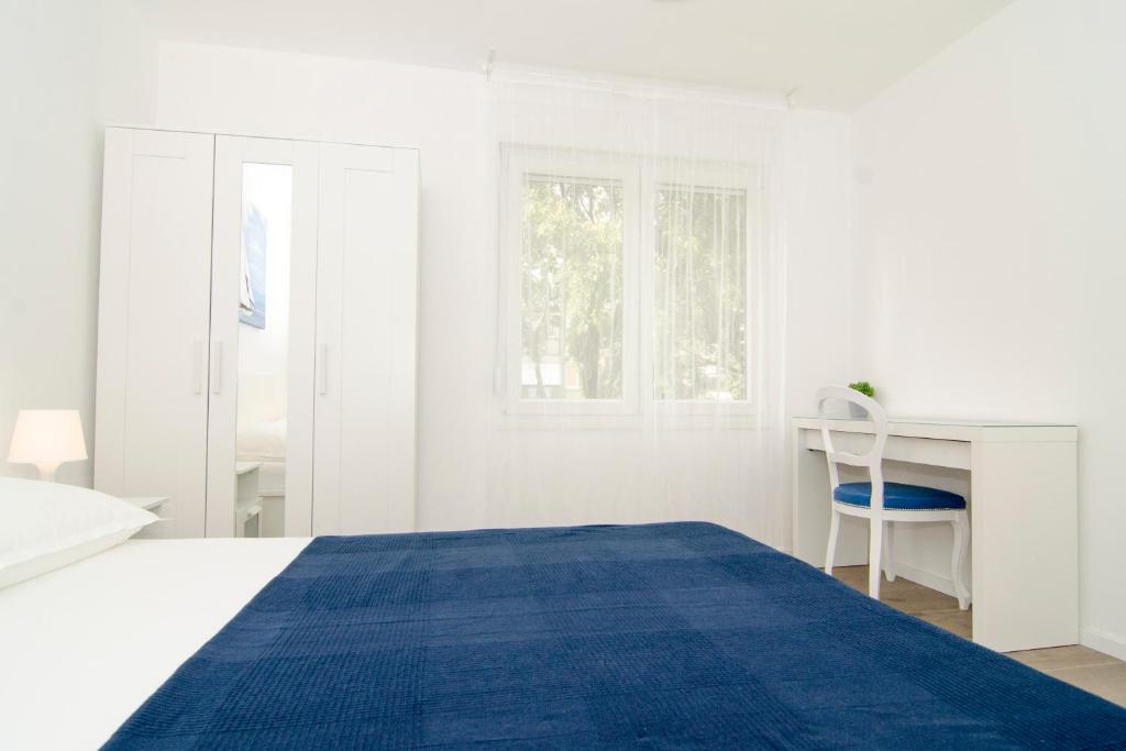 Posteľ alebo postele v izbe v ubytovaní Apartman M&D