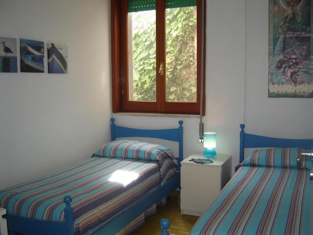 Posteľ alebo postele v izbe v ubytovaní Casa delle dune