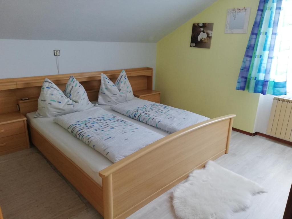 Posteľ alebo postele v izbe v ubytovaní Gästezimmer Glaser