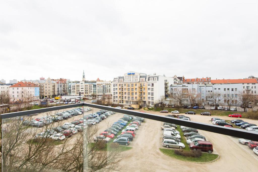 Výhľad na mesto Poznaň alebo výhľad na mesto priamo z apartmánu