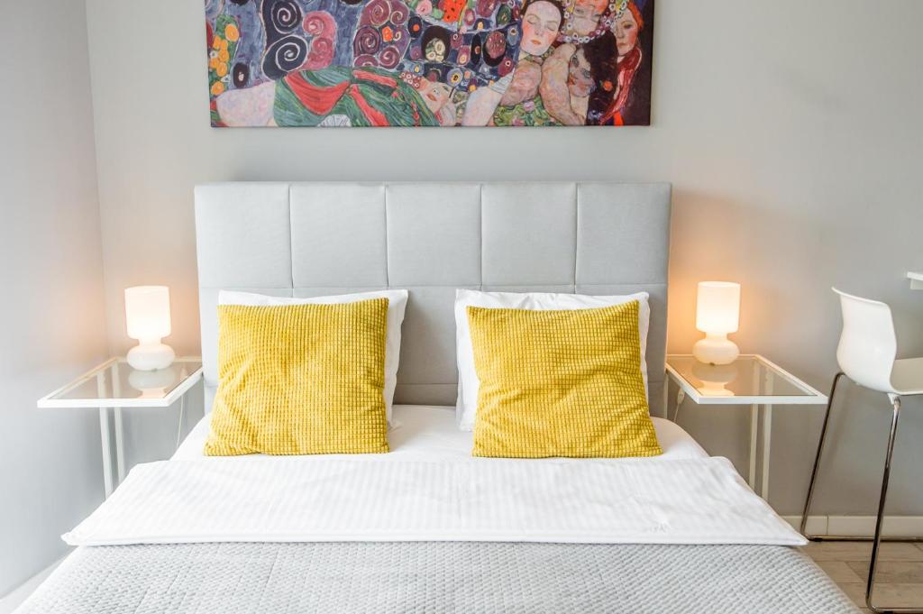 Posteľ alebo postele v izbe v ubytovaní Super-Apartamenty Old Market