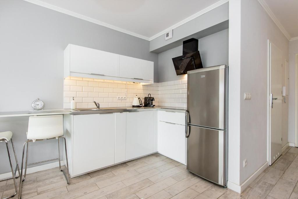 Kuchyňa alebo kuchynka v ubytovaní Super-Apartamenty Old Market