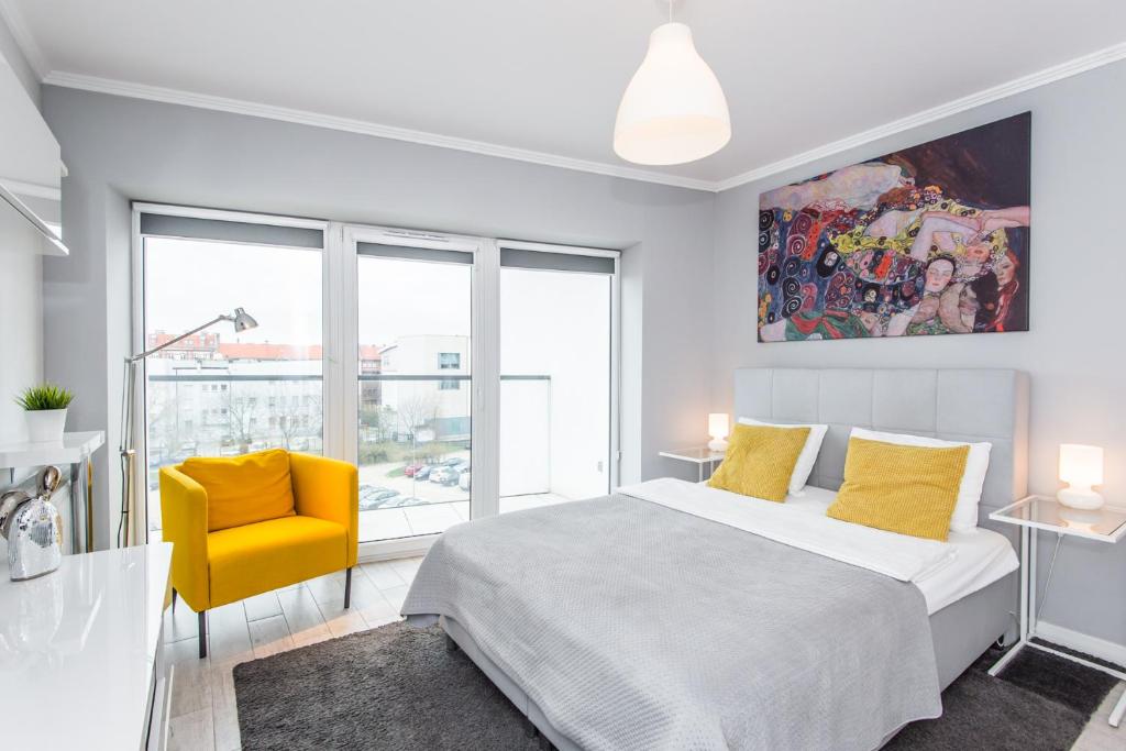 Posteľ alebo postele v izbe v ubytovaní Super-Apartamenty Old Market