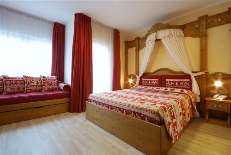 Postel nebo postele na pokoji v ubytování Hotel Bellaria