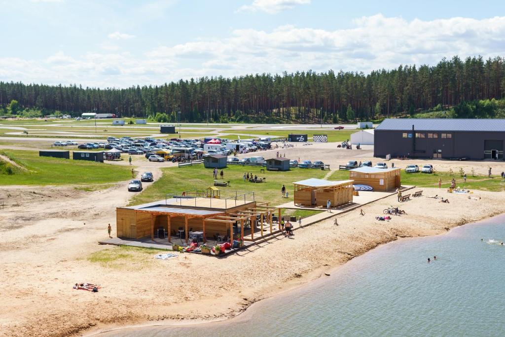 an aerial view of a building next to the water at 333 CAMPING PARK in Silakrogs