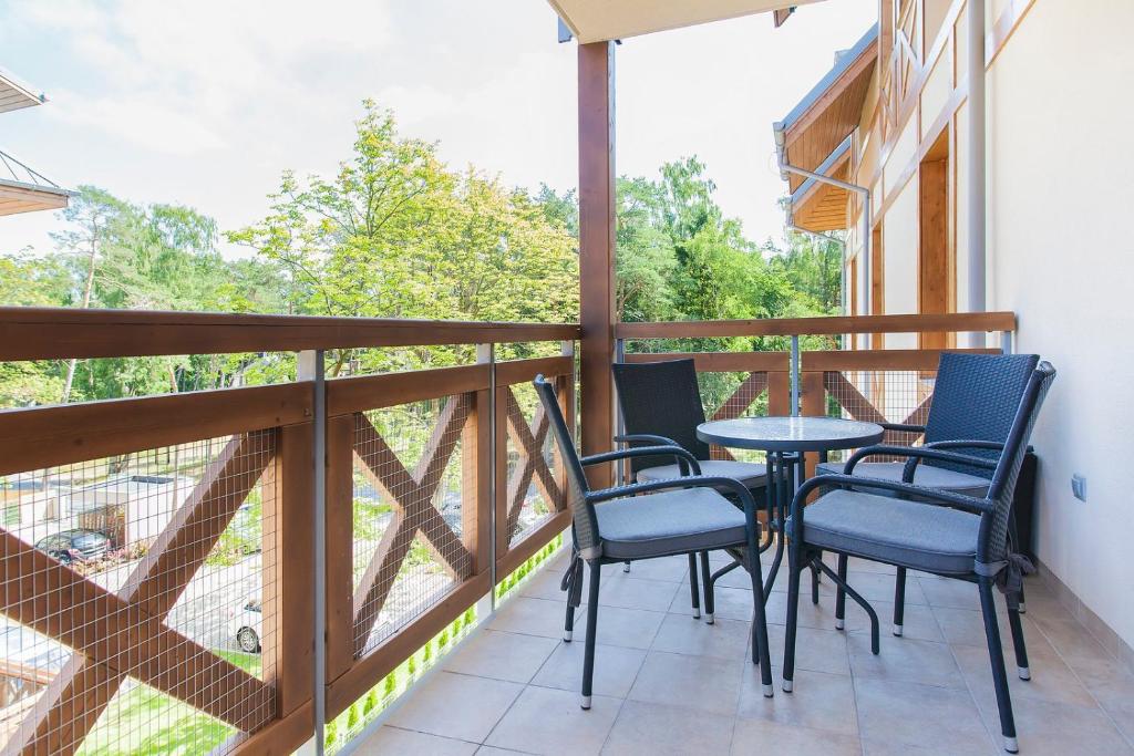 Balkon lub taras w obiekcie Mi Casa Holidays Rezydencja Park Rodzinna