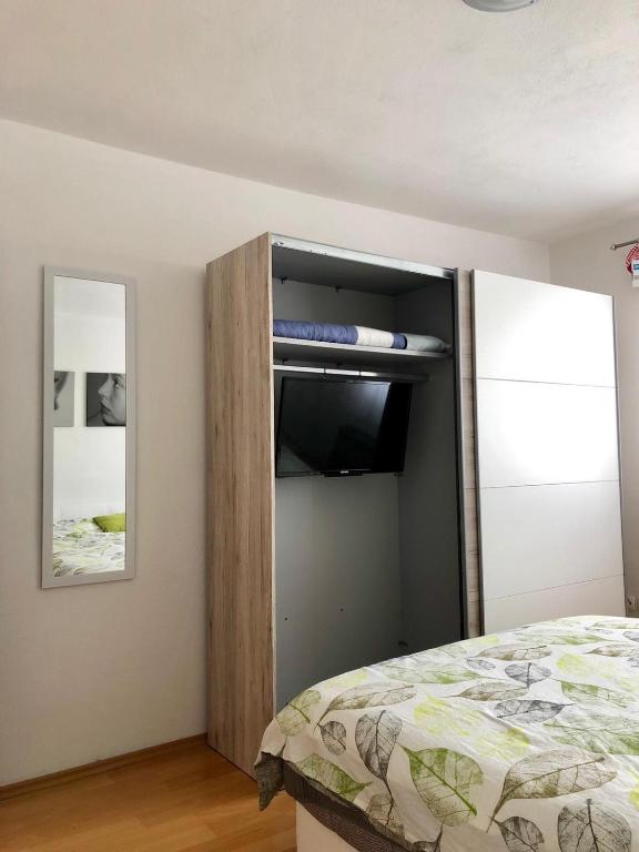 Posteľ alebo postele v izbe v ubytovaní Apartmani Dujmovic